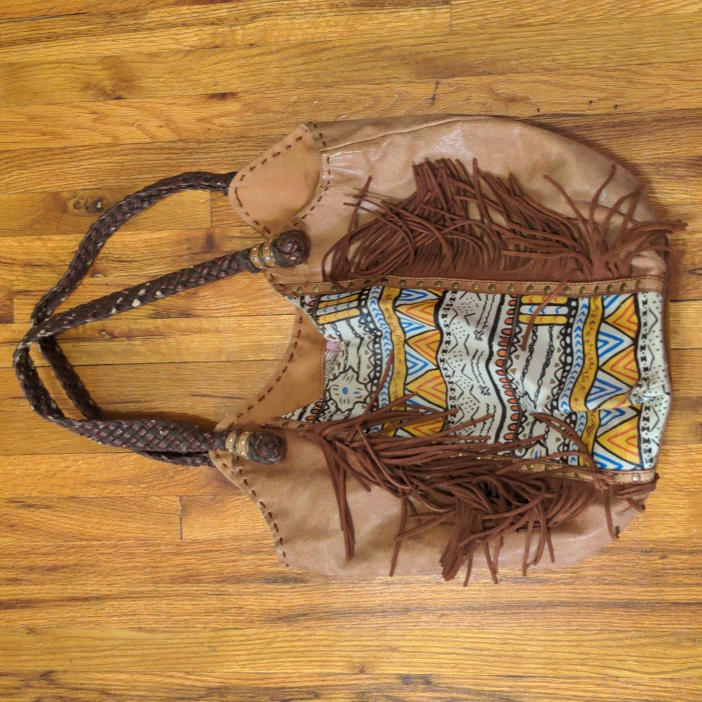 The Sak leather tote hobo bag with fringe